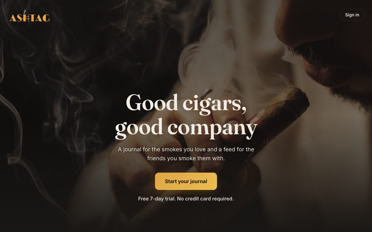 AshTag homepage: a lit cigar on dark wood